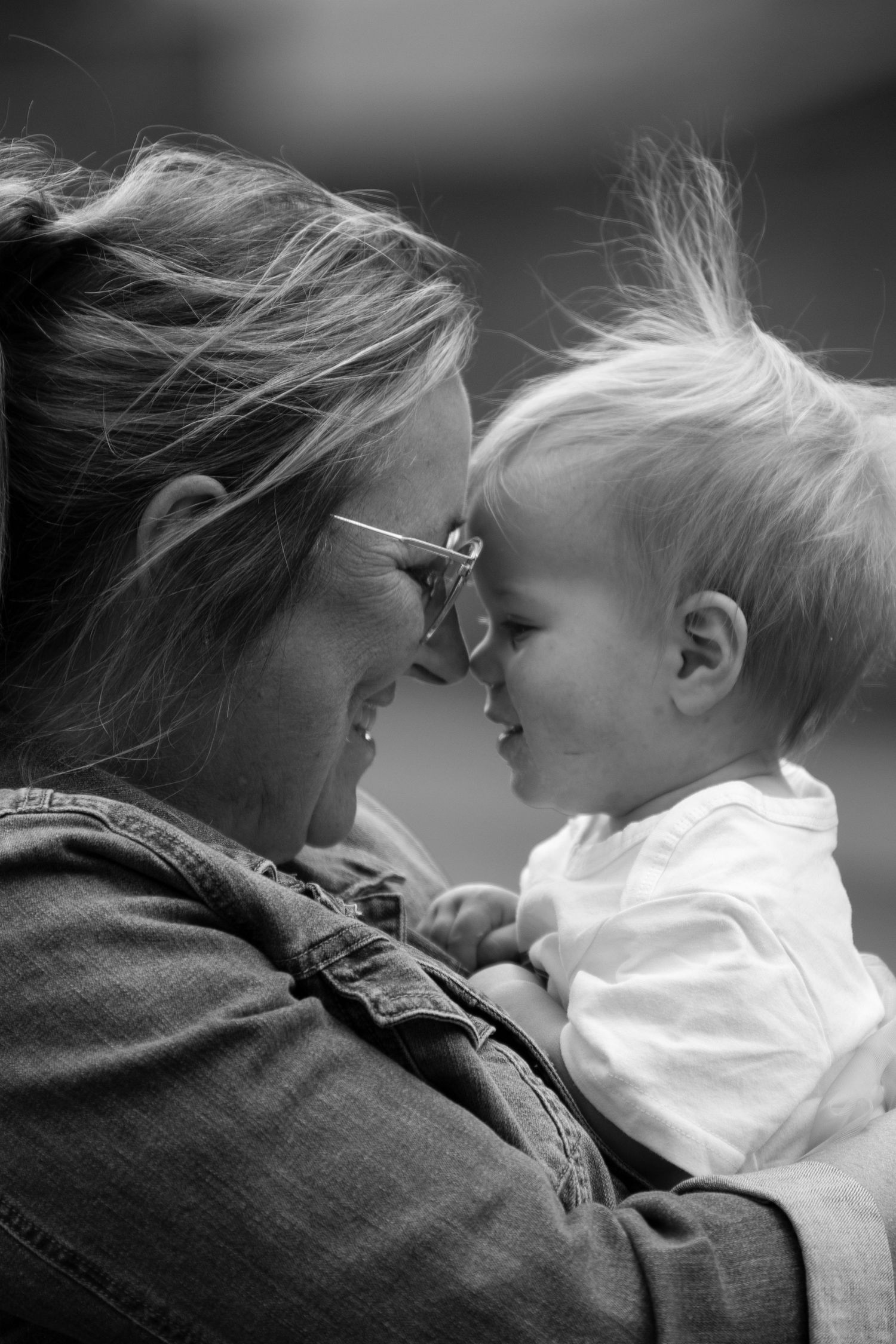 A touching black and white portrait showing connection and joy.