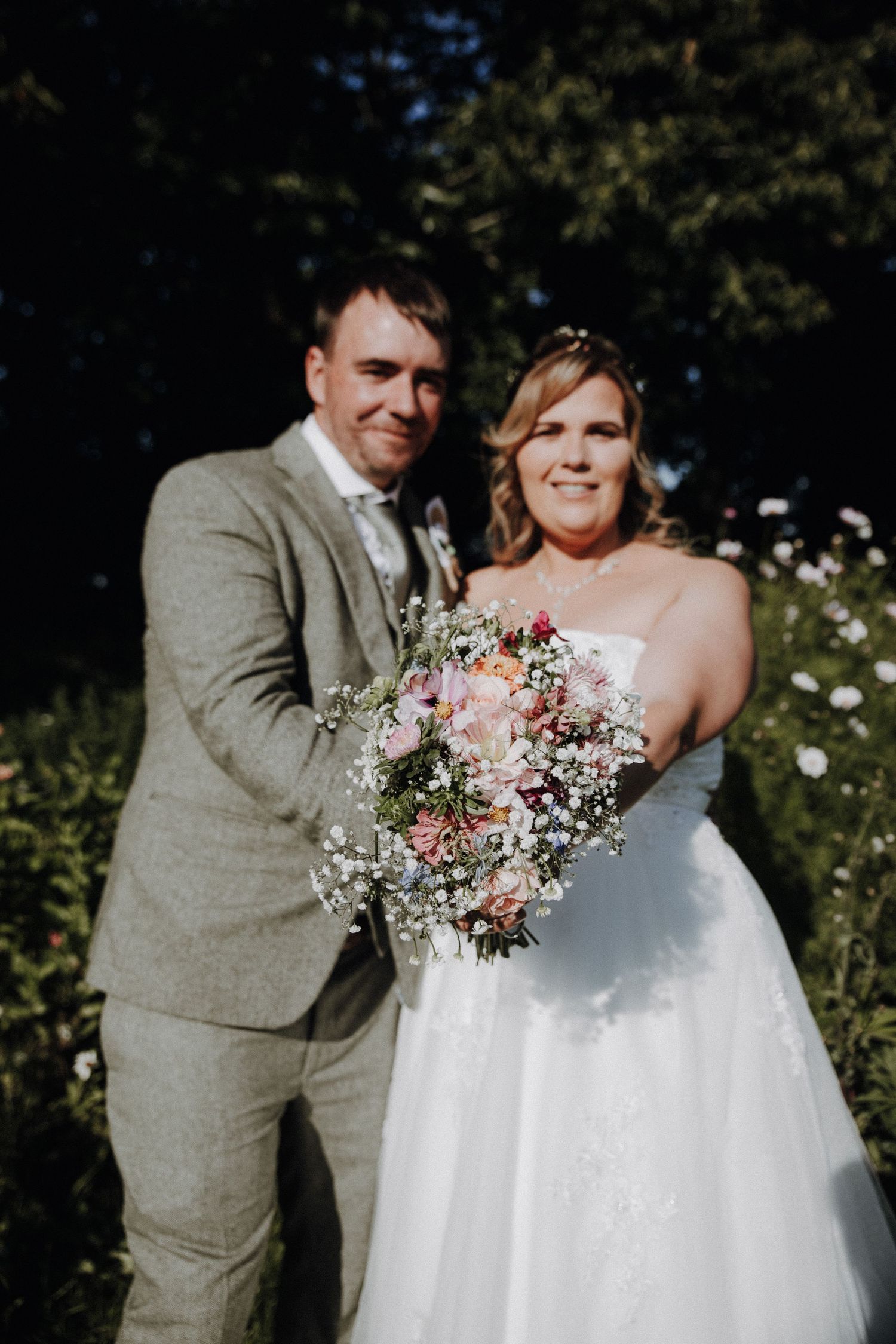 flowers bride and groom couple shots