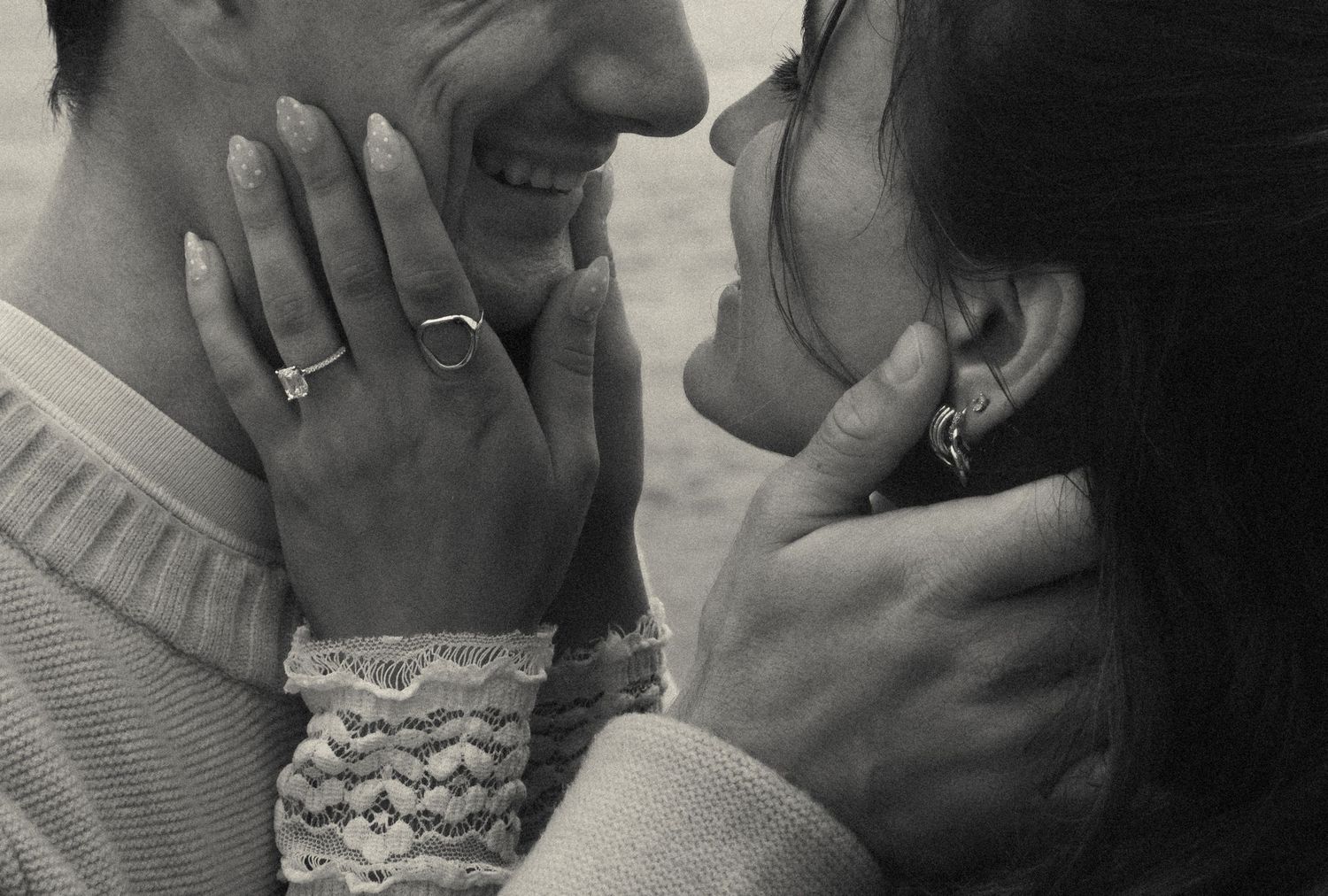 Artistic black and white close-up shots of a romantic moment between two people.