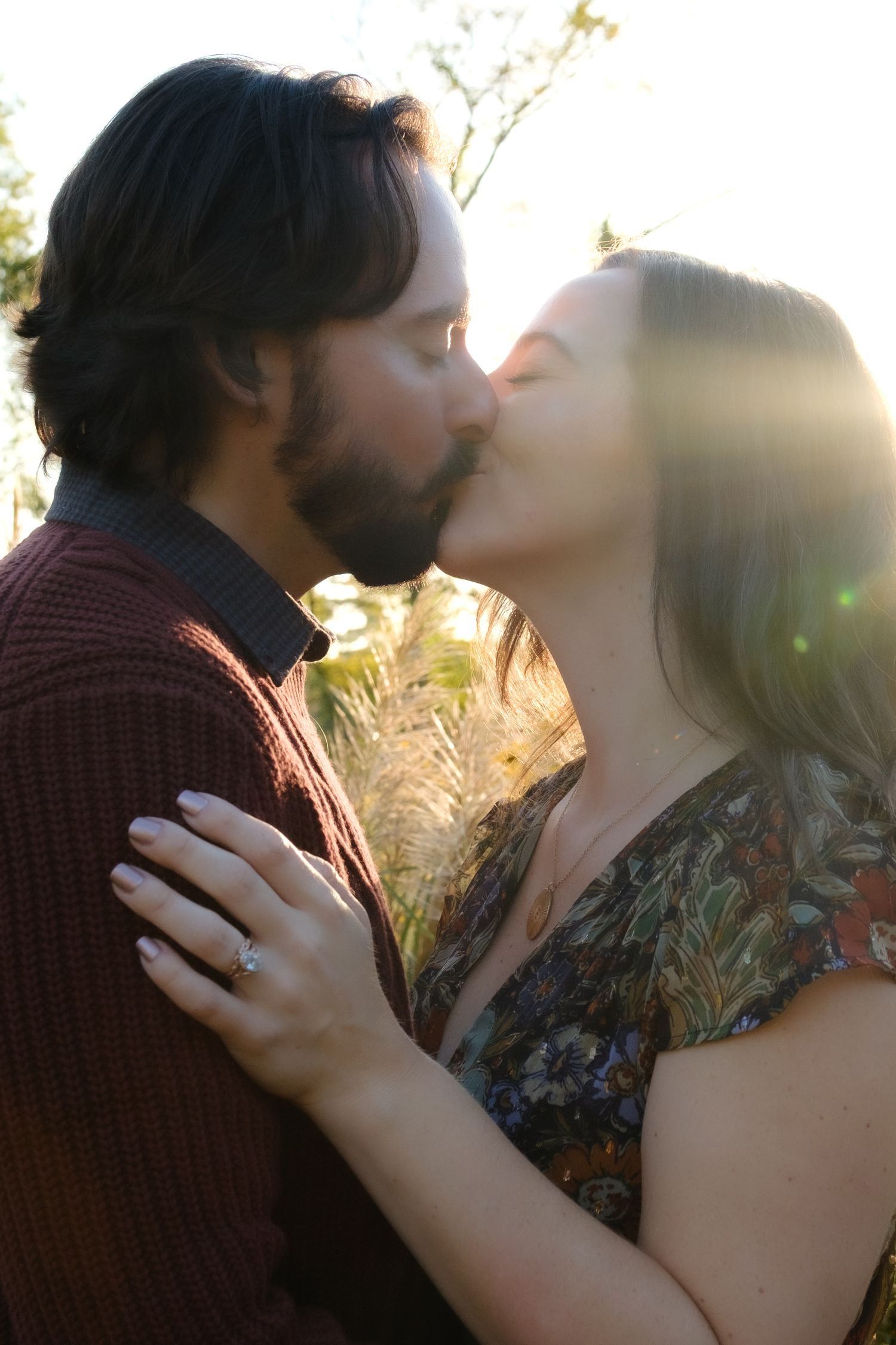 Family photos, Houston, Tx, couple shares a kiss