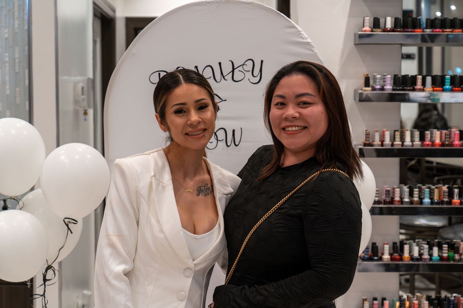 Casual group photos in a bright salon space with white balloons and product displays.