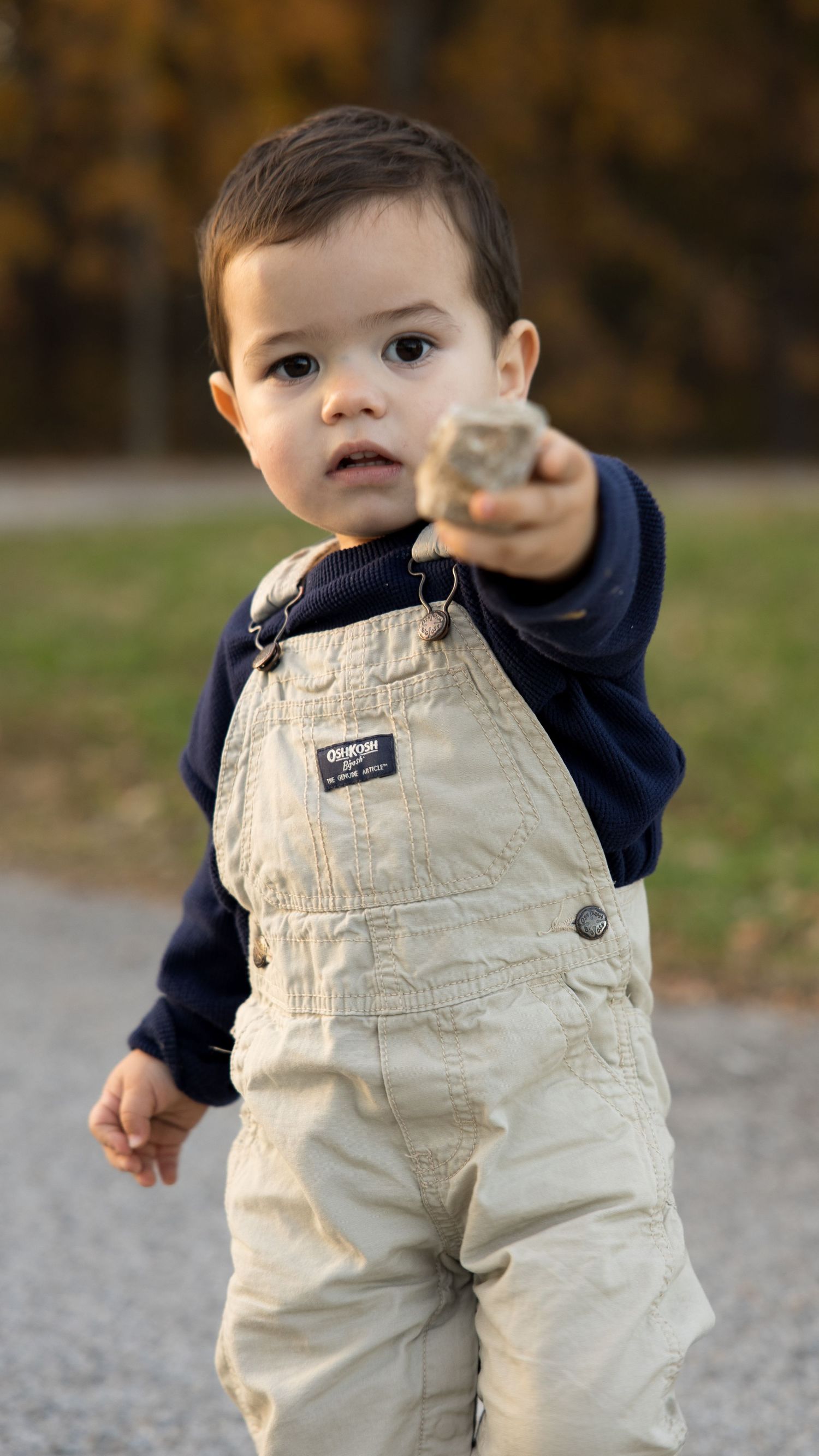 2 year old showing his treasure