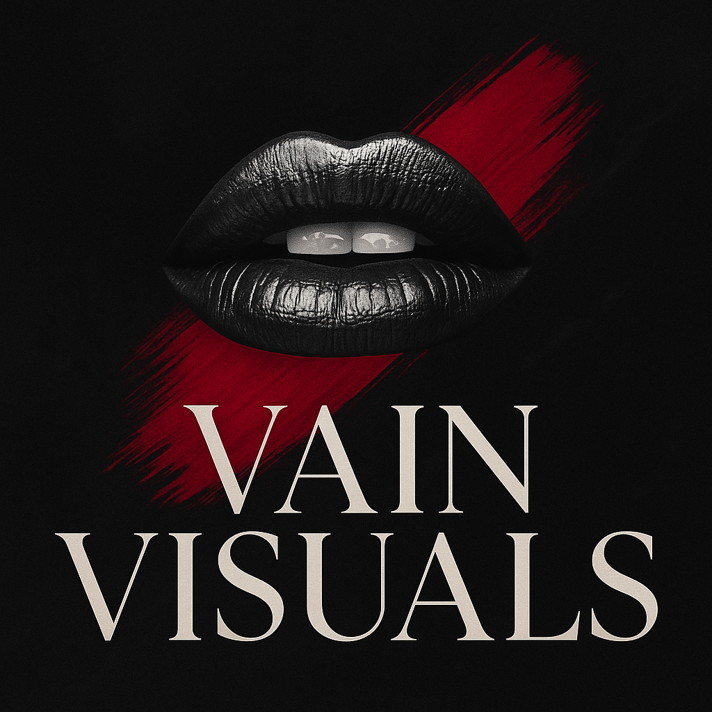 Black and white artistic image of glossy lips with a bold red brush stroke and text reading 'VAIN VISUALS' below.