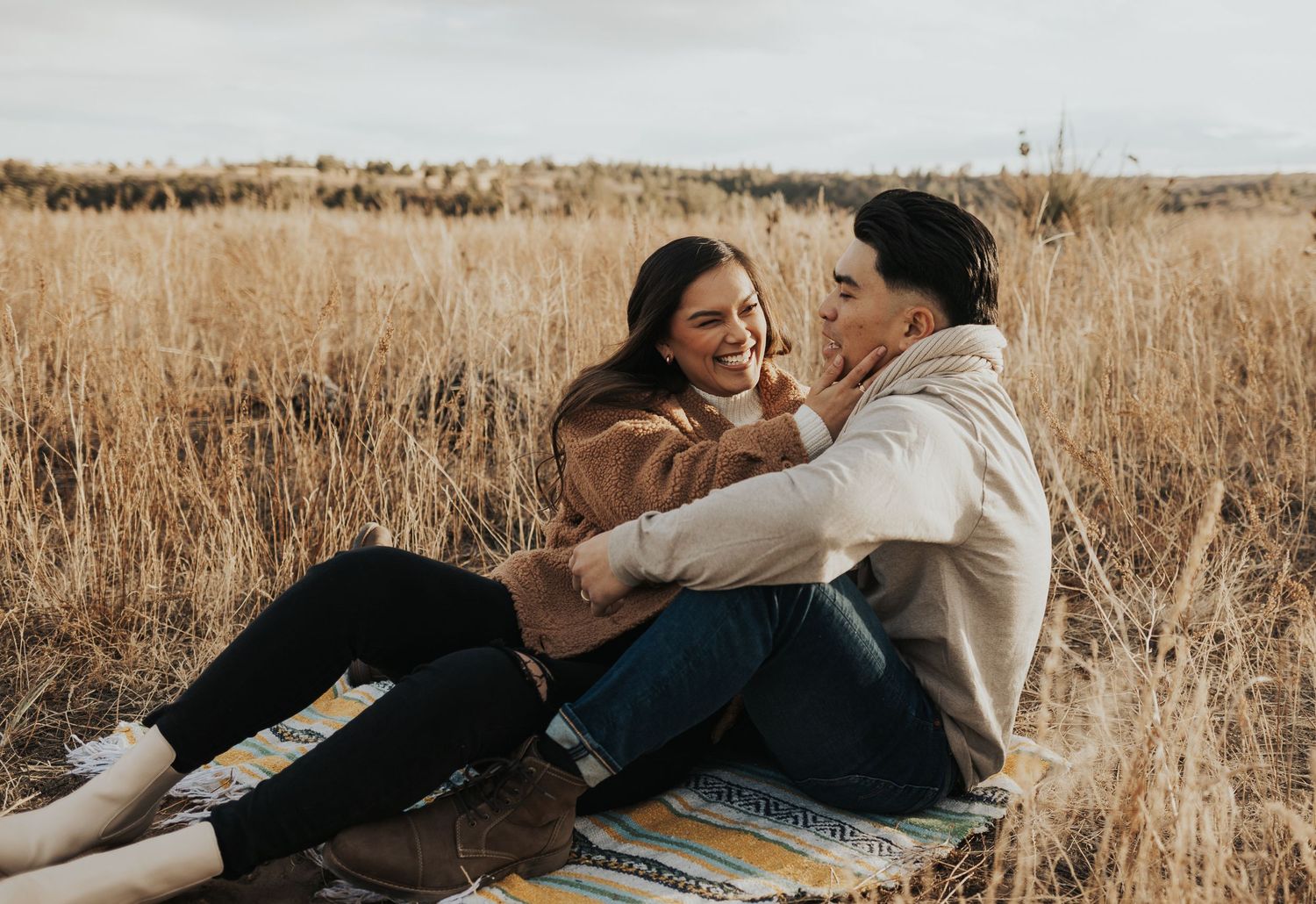 Romantic couples photography sequence in a golden autumn field showing tender embraces and candid moments.