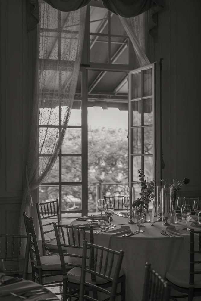 open floor to ceiling window with arch