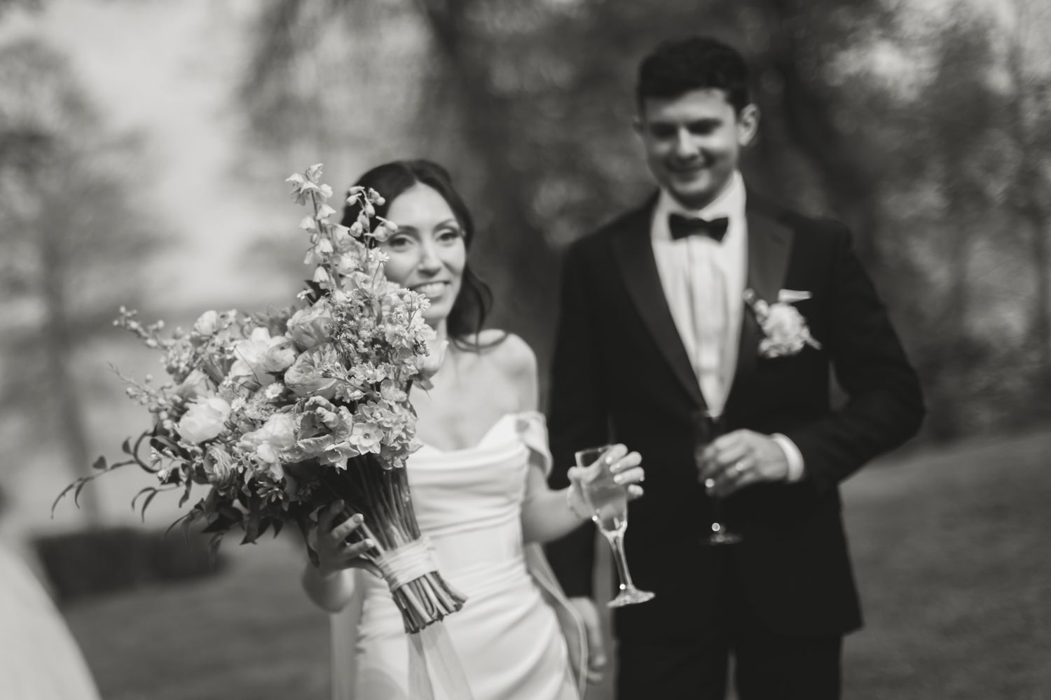 black and white photo of couple smiling