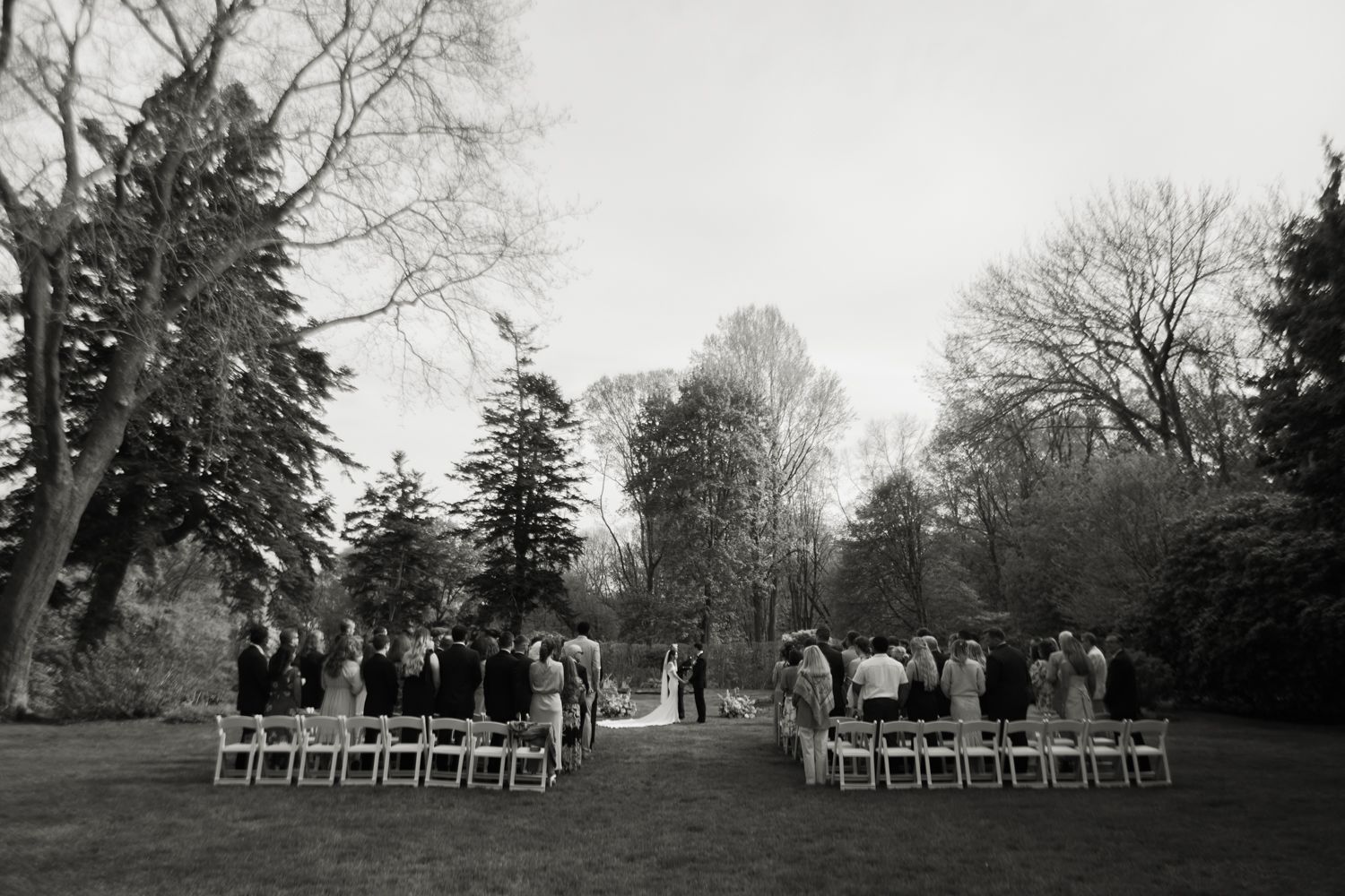 black and white photo of outdoor wedding ceremony