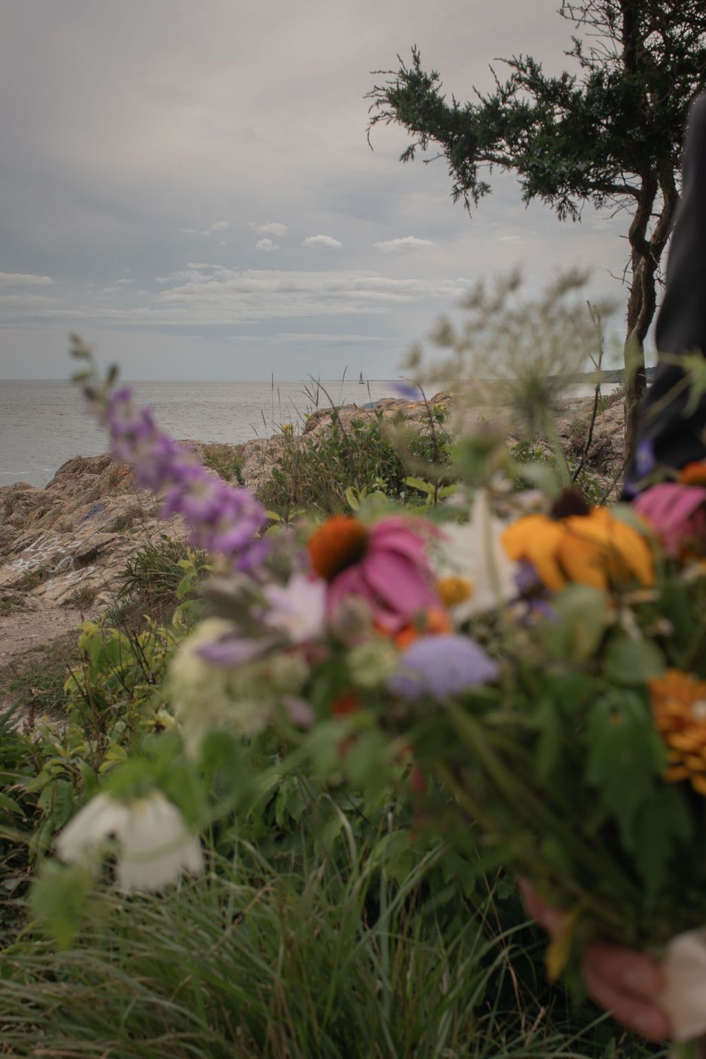 wildflower bouquet with the ocean in the background
