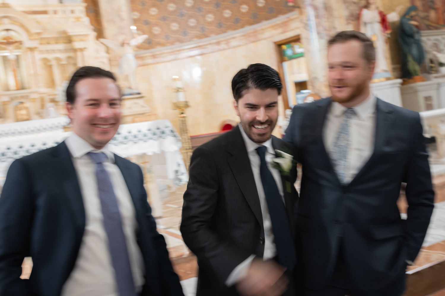 men greeting each other at wedding
