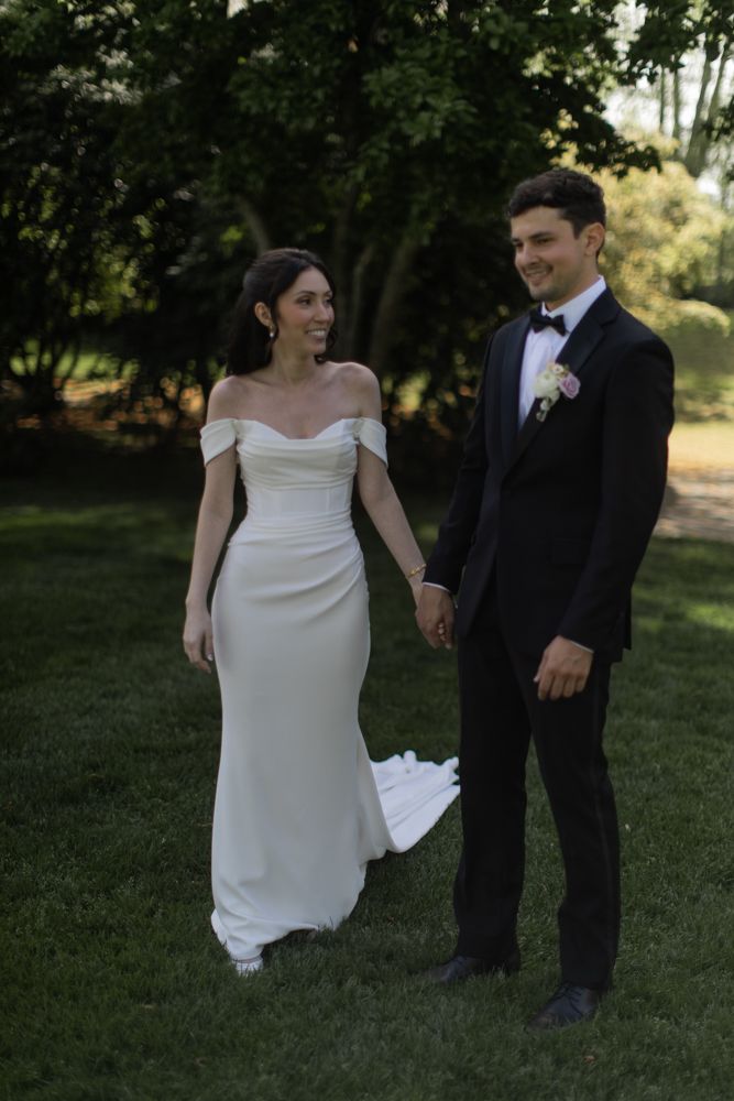 candid portrait of bride and groom outdoors