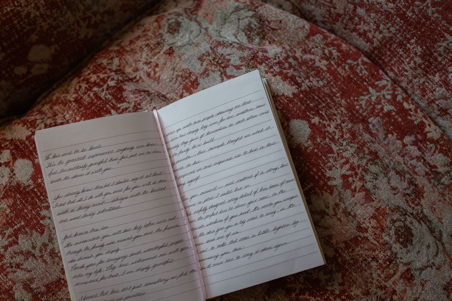 photo of vow book with black handwriting