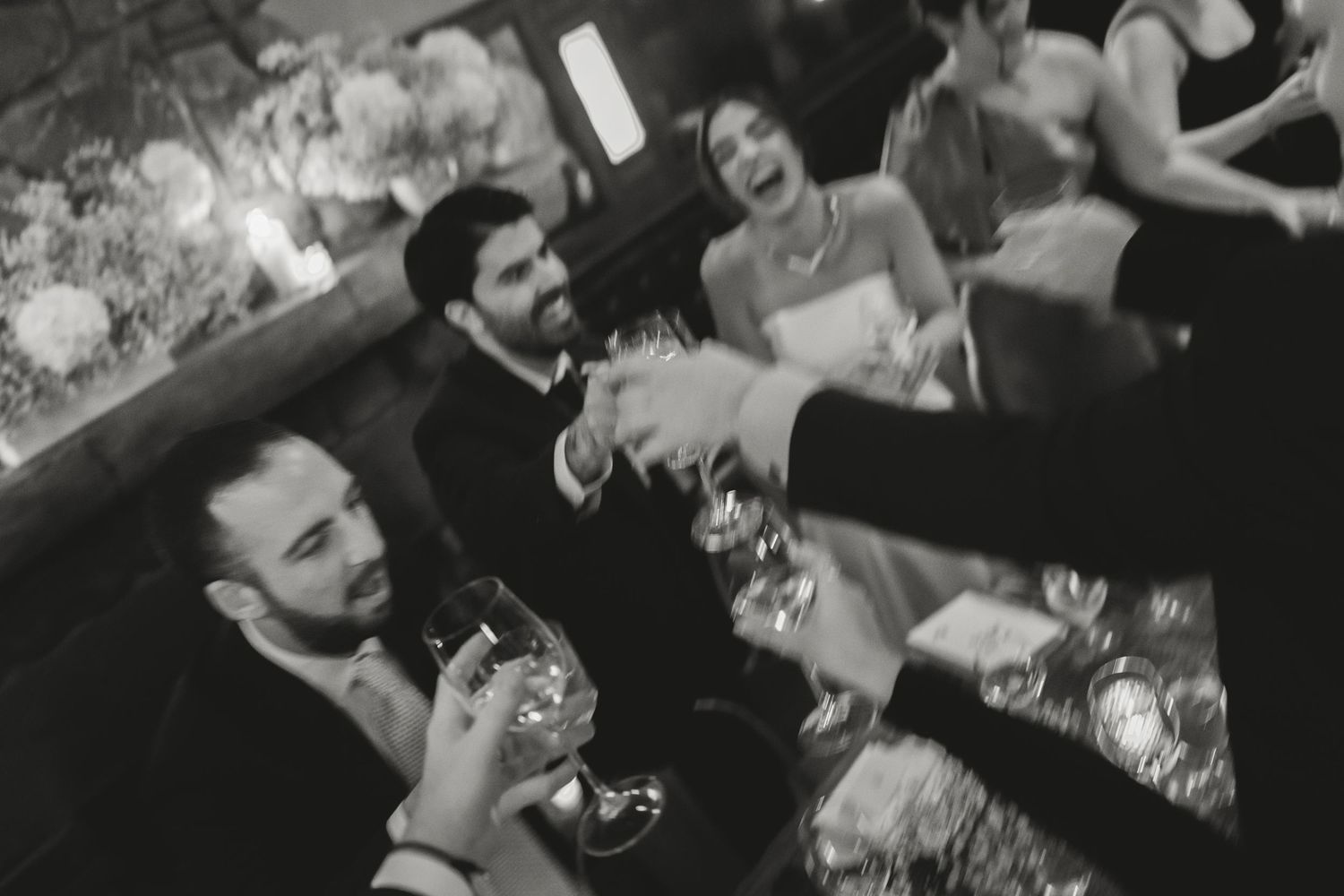 Guests laughing at wedding reception in NYC
