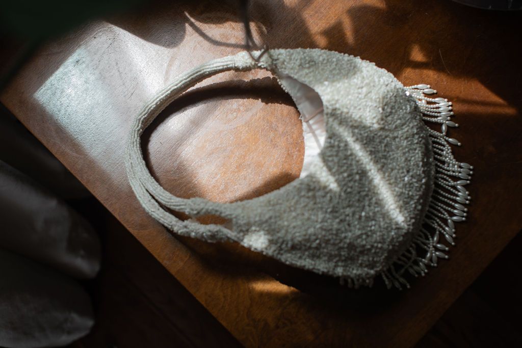 white beaded purse in the shadows