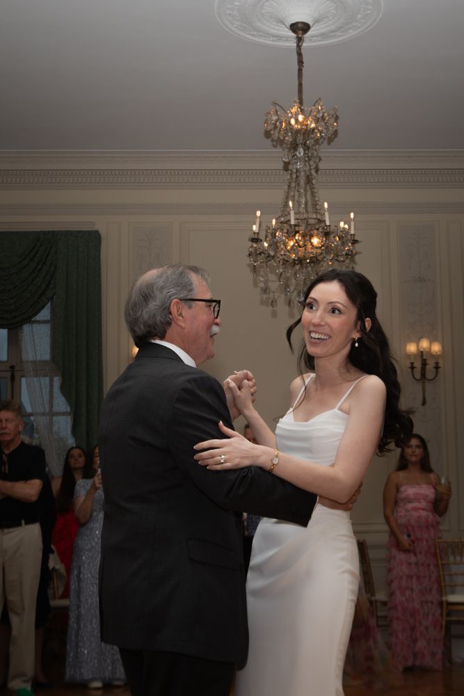 bride dancing with her dad at wedding reception