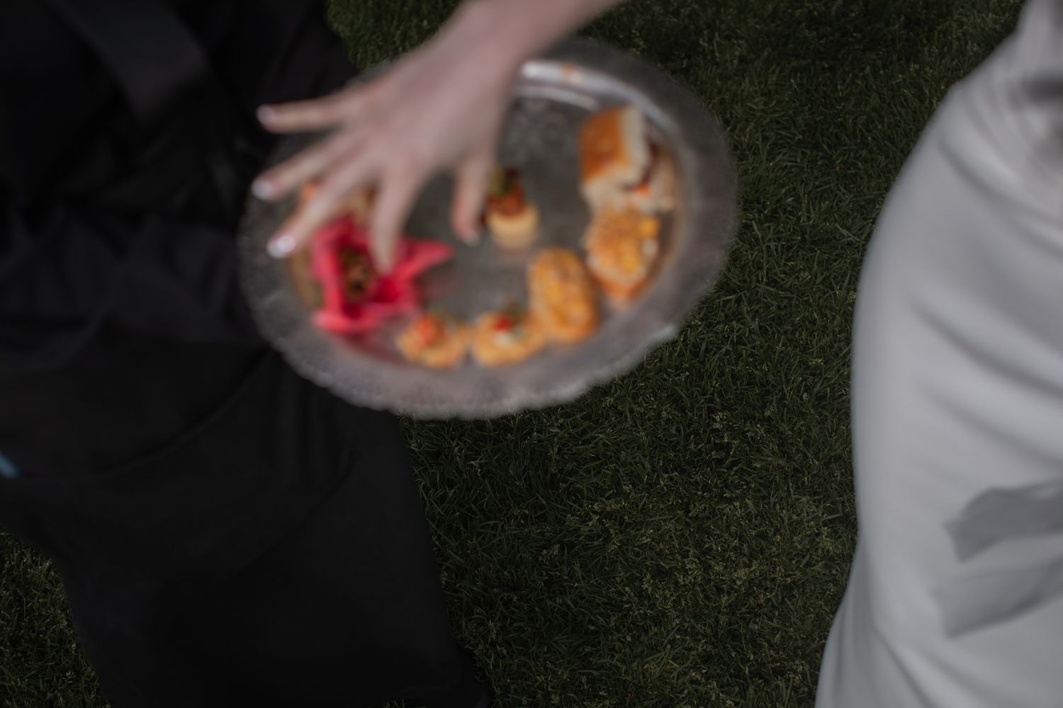 guest taking hors d'oeuvres at wedding reception