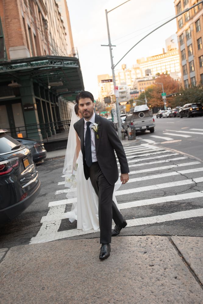 candid photo of groom walking