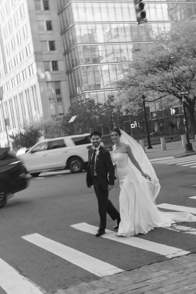 bride and groom on crosswalk