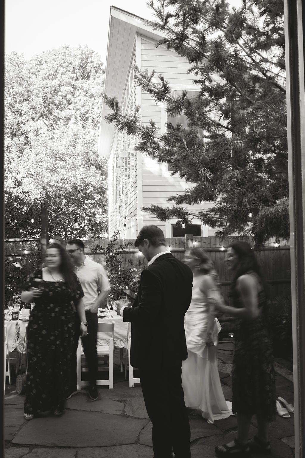 group enjoys backyard wedding reception in newport, rhode island