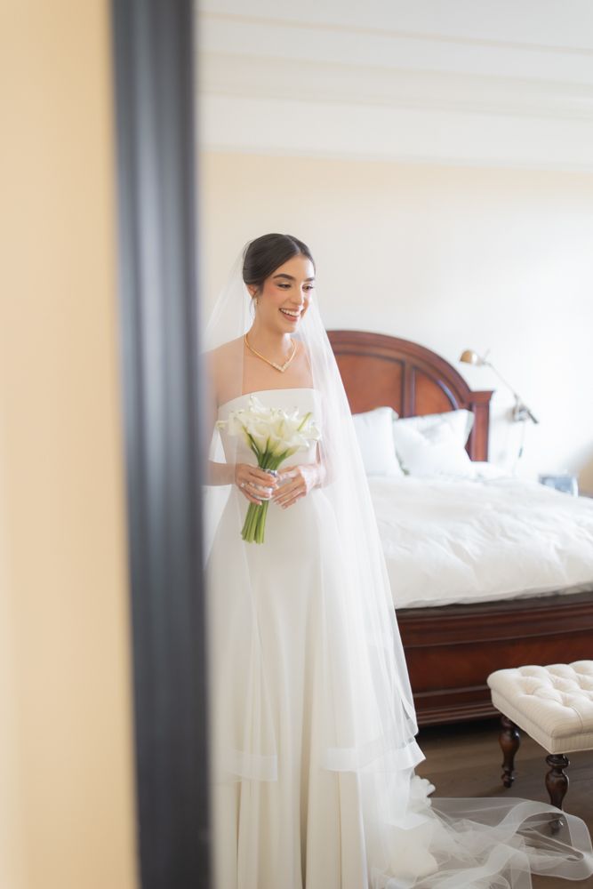 bride looking in the mirror