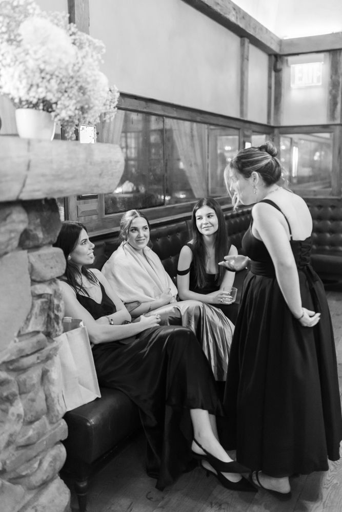wedding guests talking at cocktail hour