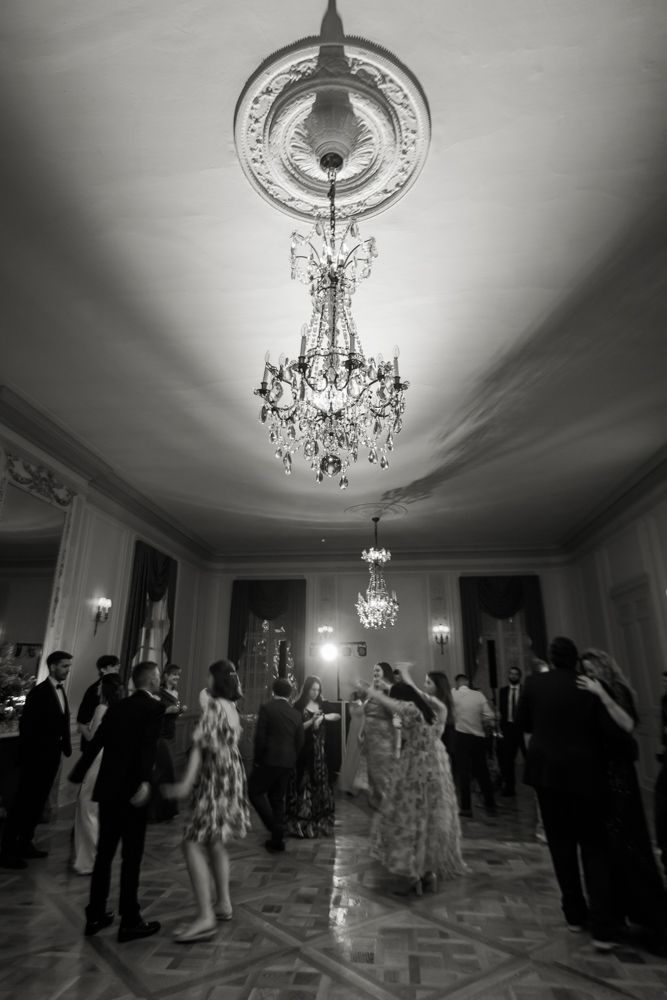 large ballroom with people dancing