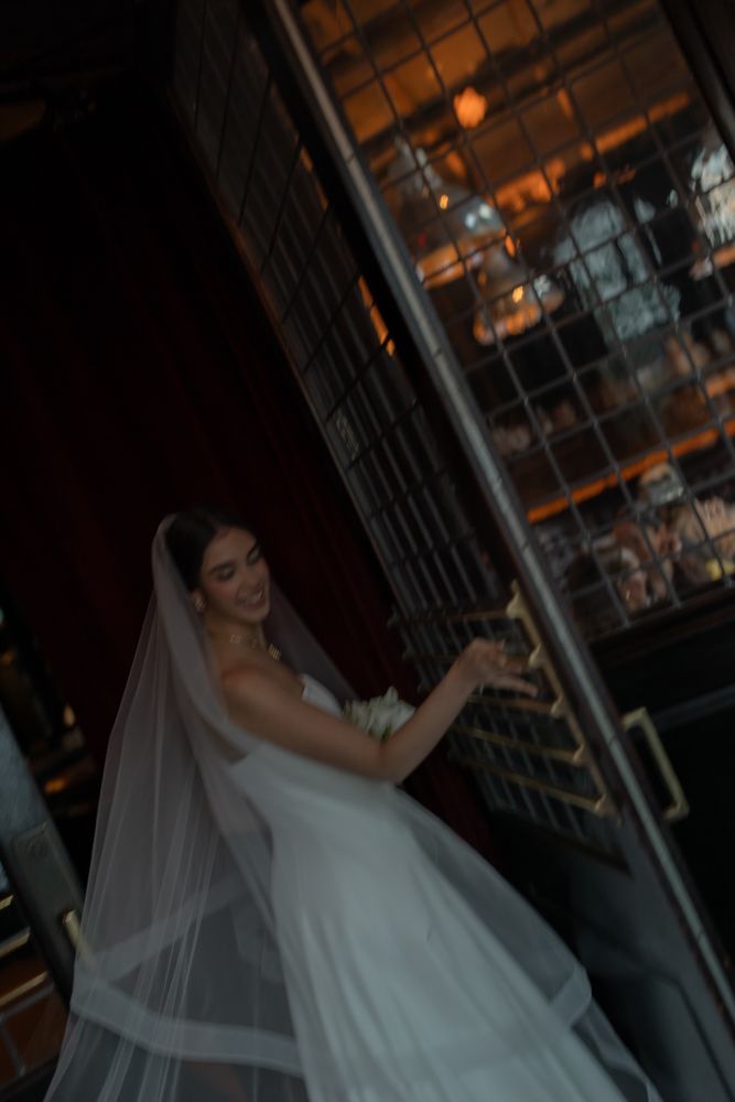 bride opening restaurant door