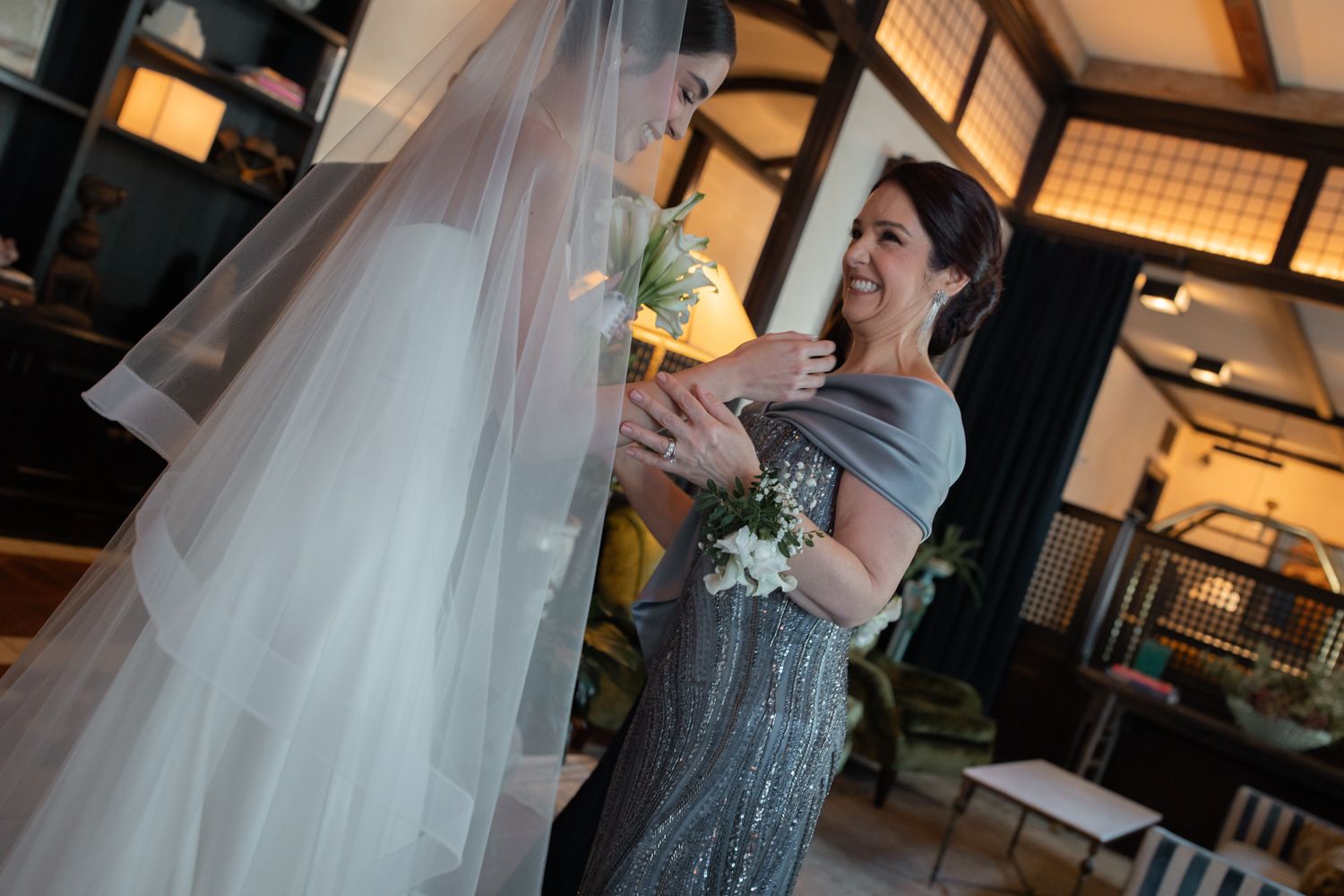 candid wedding photo in hotel lobby