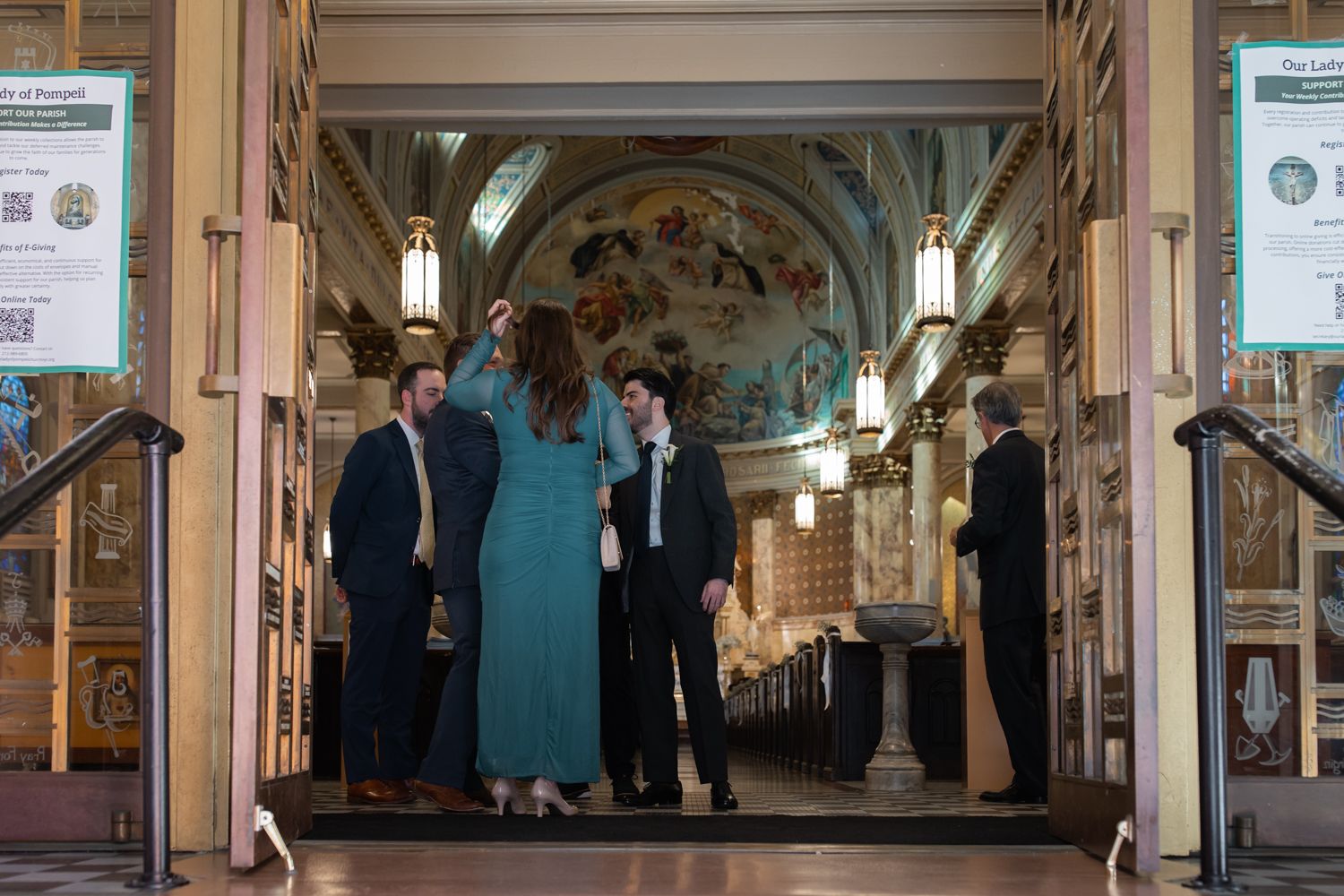 photo of guests gathering at church wedding
