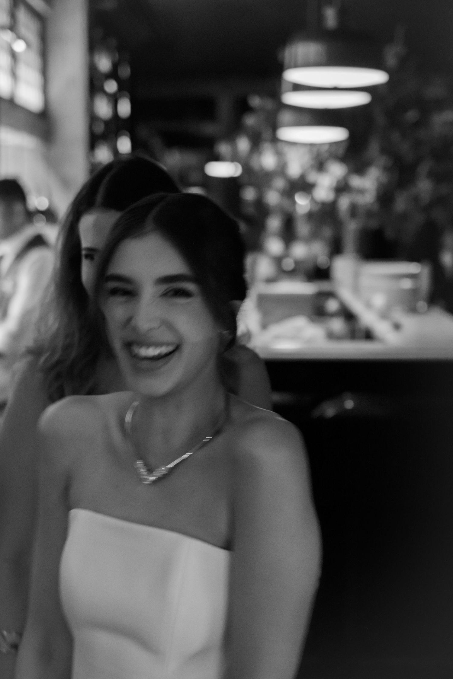 candid photo of bride smiling at camera