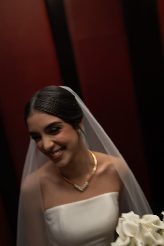 candid photo of bride in elevator in new york city