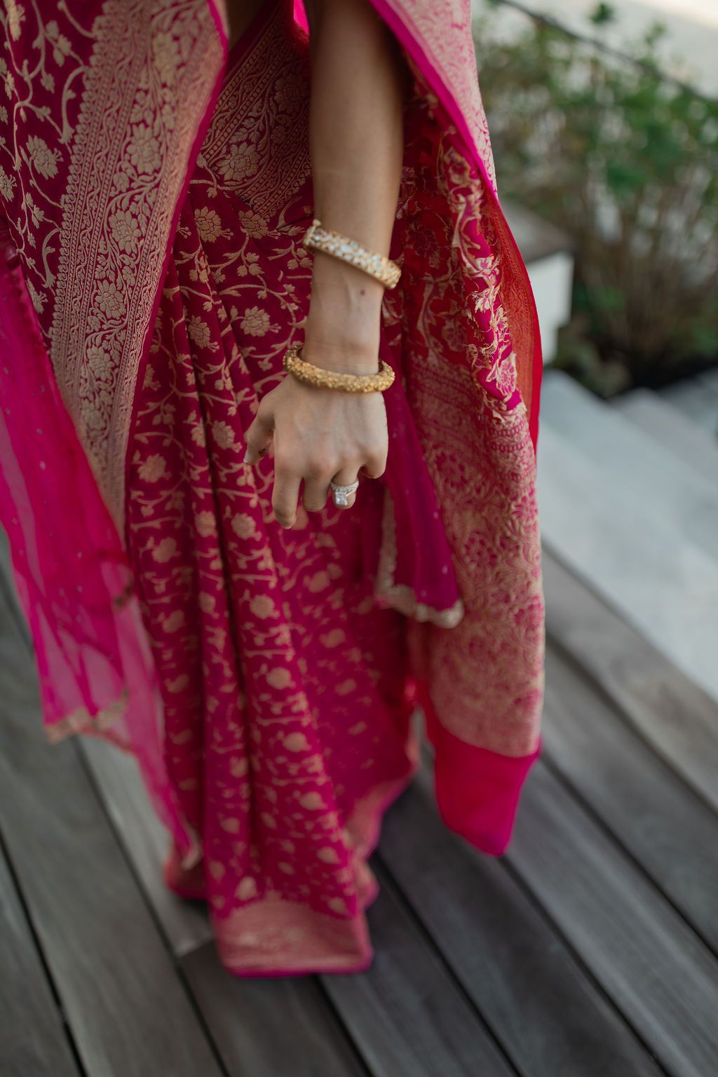 indian wedding dress with gold bracelets