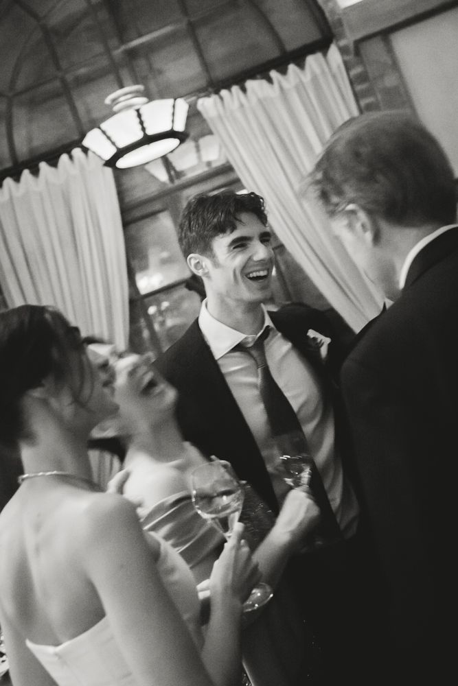 guests laughing at cocktail hour