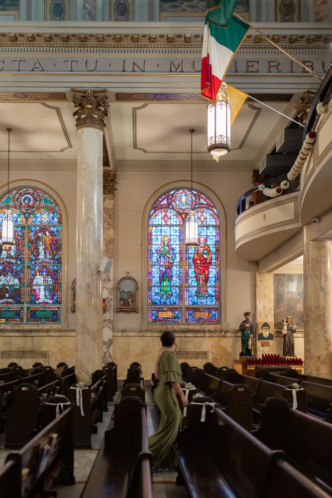 woman in green dress at church