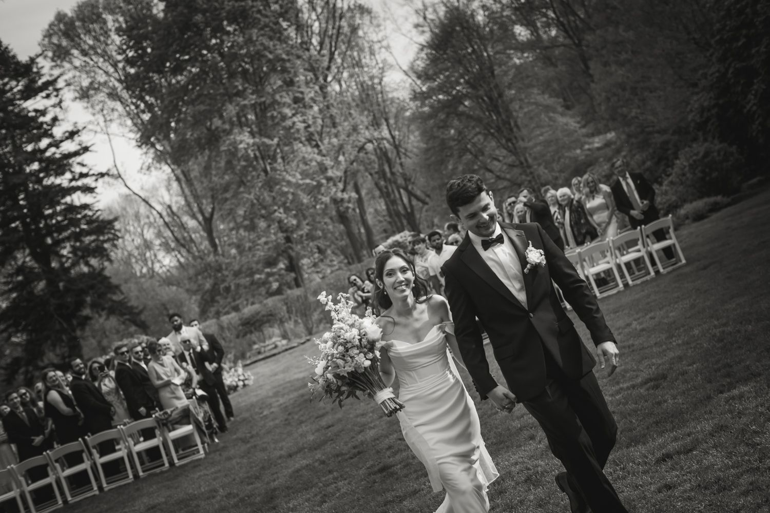 bride and groom smile after getting married