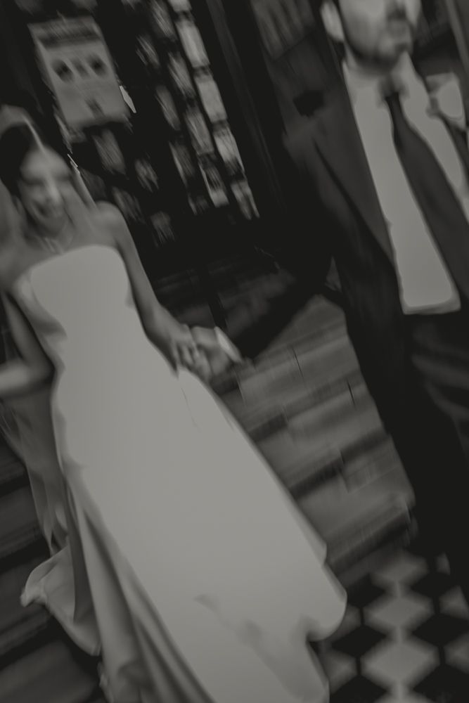 couple walk down stairs in new york city