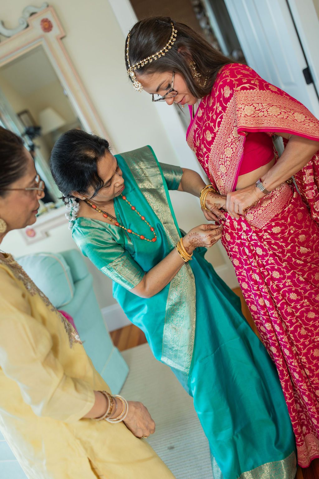woman getting ready for indian wedding ceremony