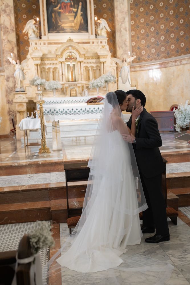 bride and groom kiss