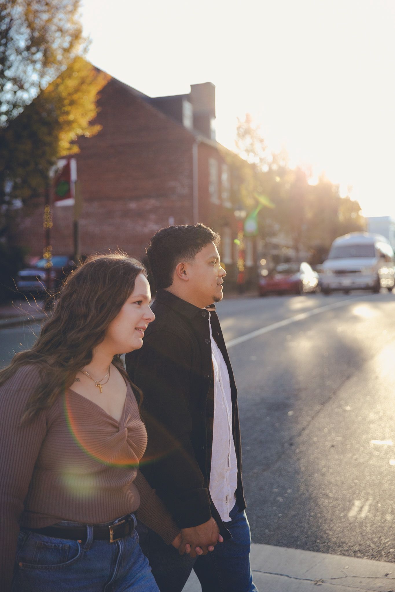 Film Style photo of a Couple crossing a city street