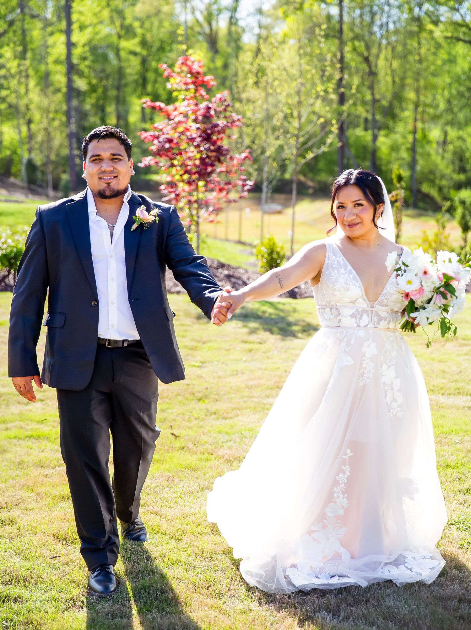 Wedding Scene with Bride and groom holding hands and walking