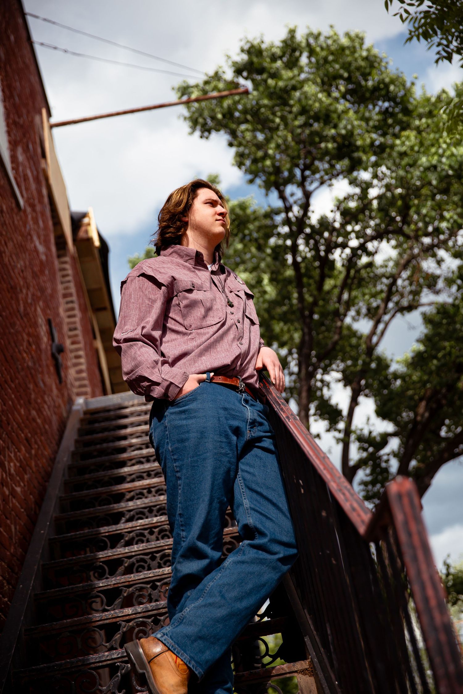 Highschool senior boy on stairs