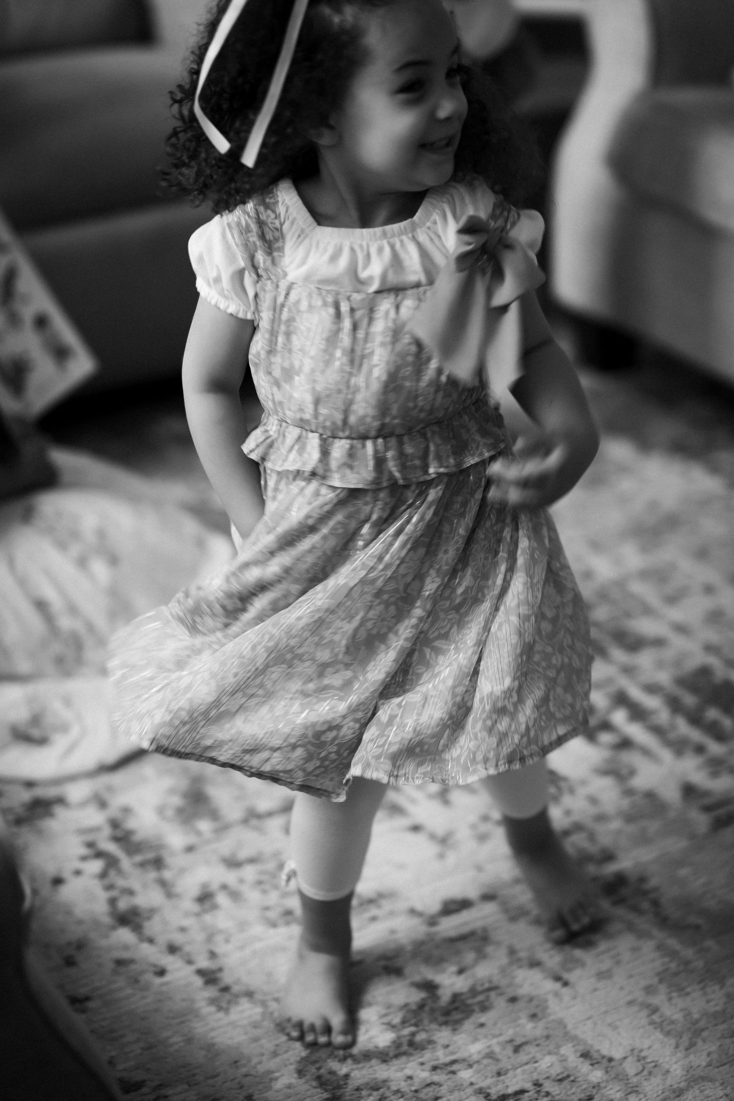 Little girl twirling her dress