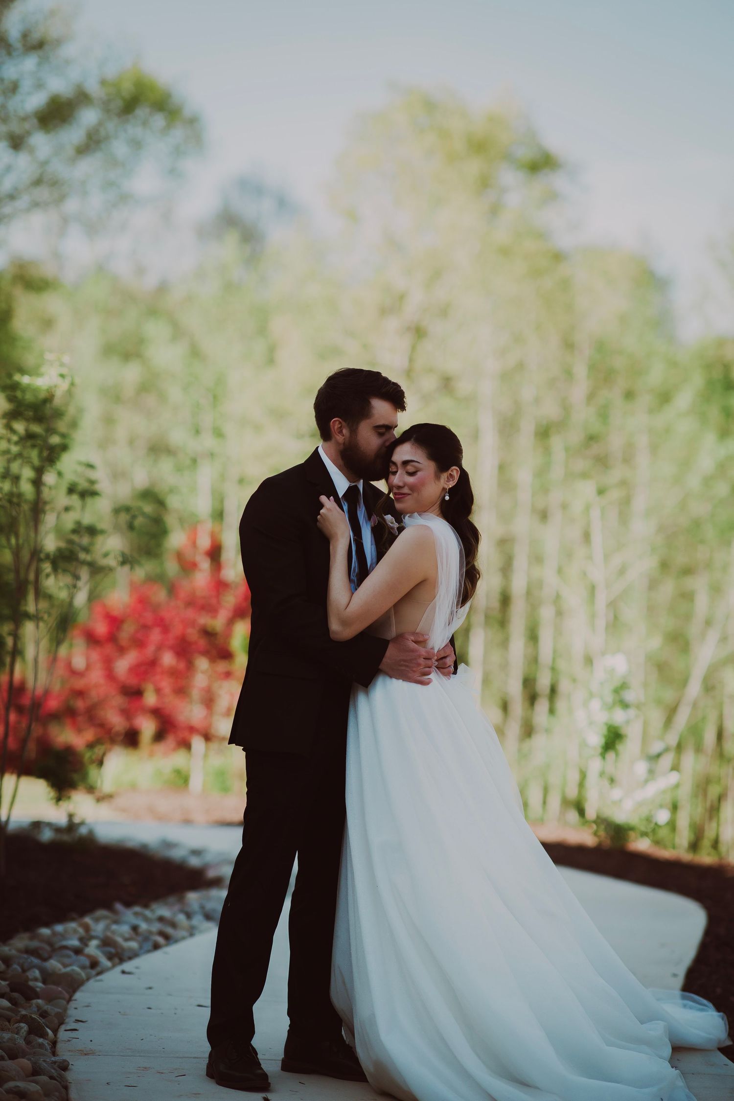 Bride and groom in warm embrace