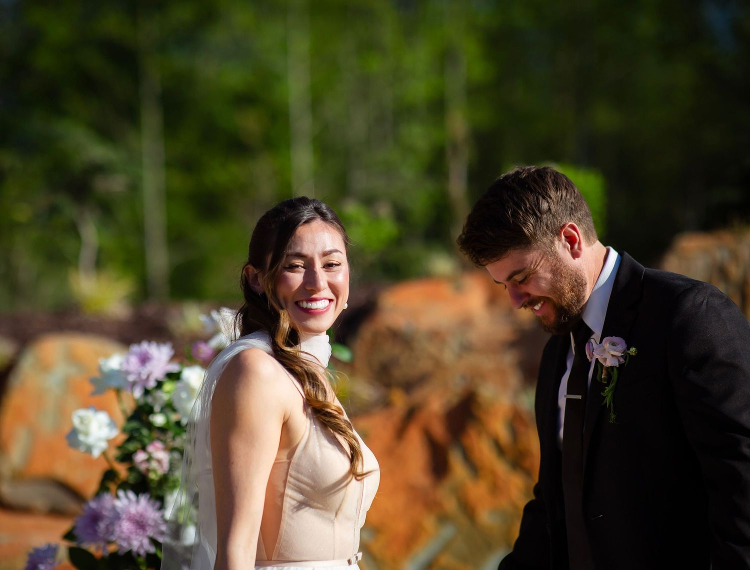 Bride and groom laughing