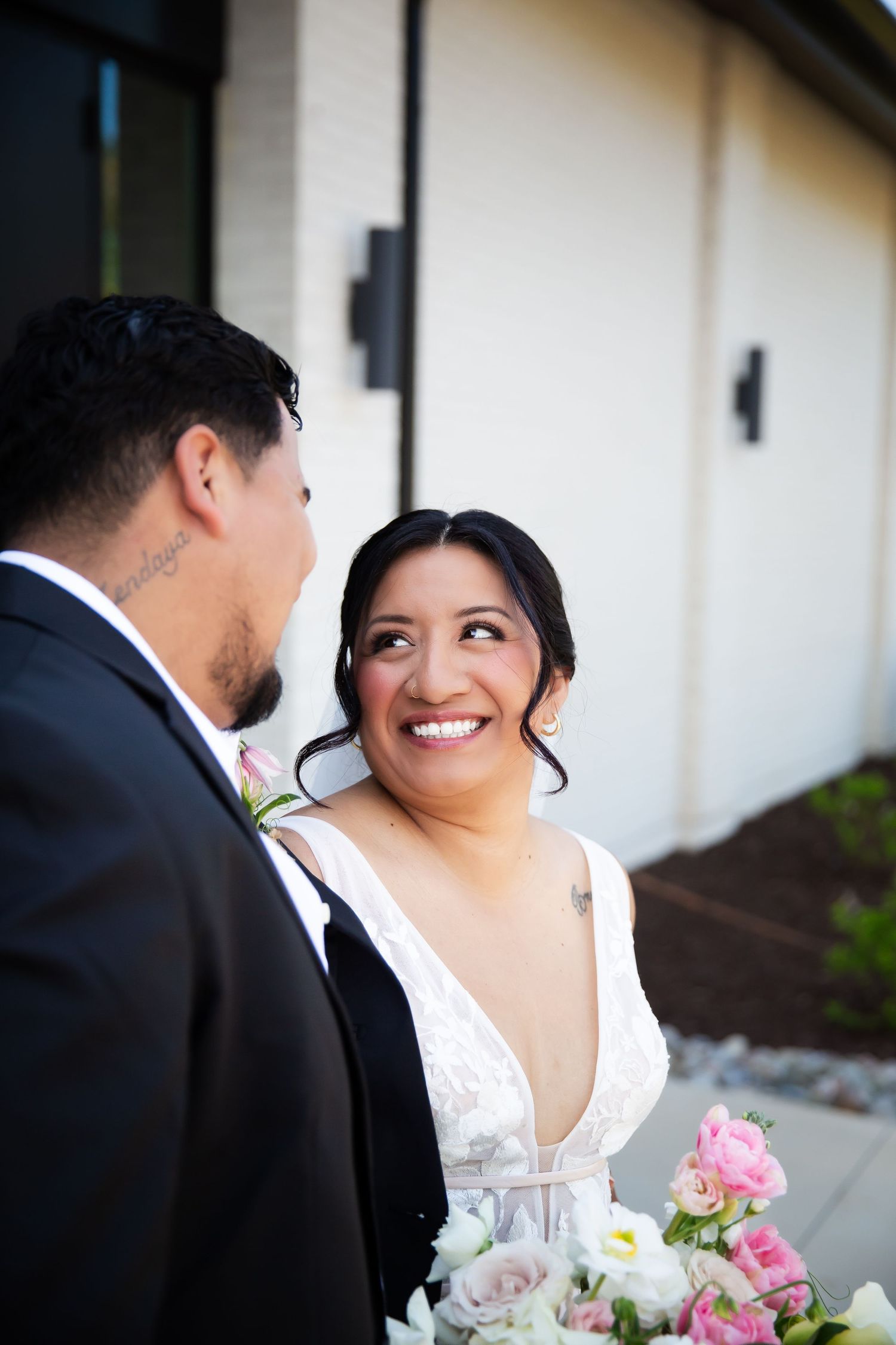 Wedding Scene with bride looking into groom's eyes