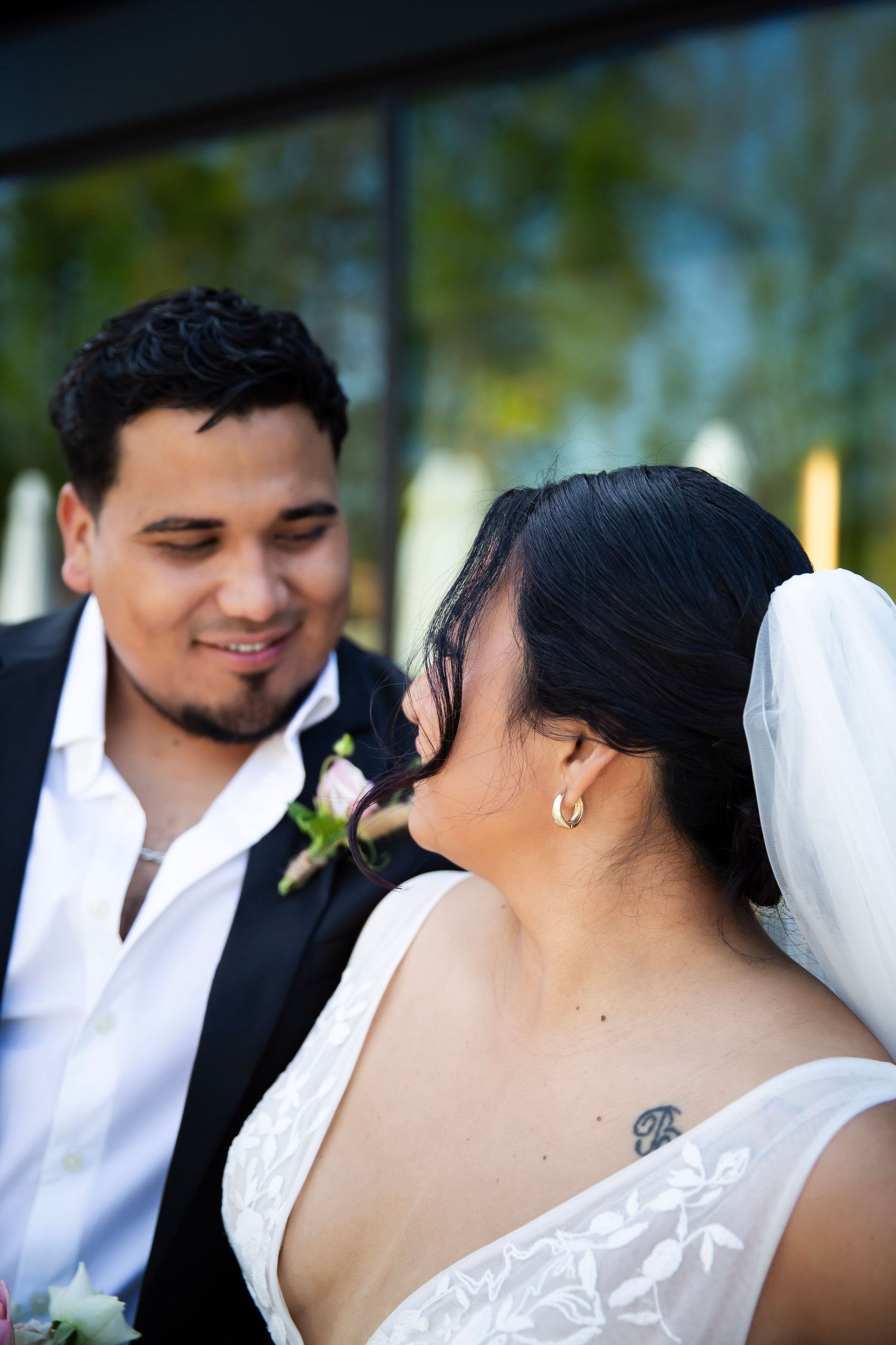 Wedding Scene with Groom looking into bride's eyes