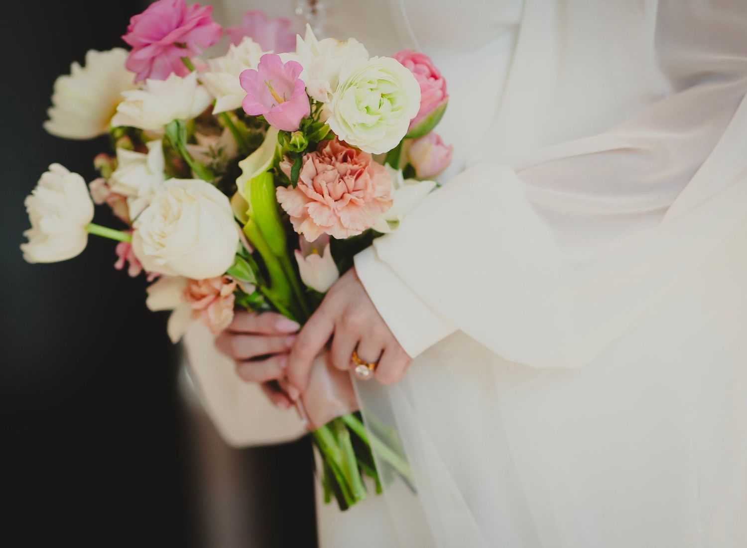 Bride holding pink and white bouquet