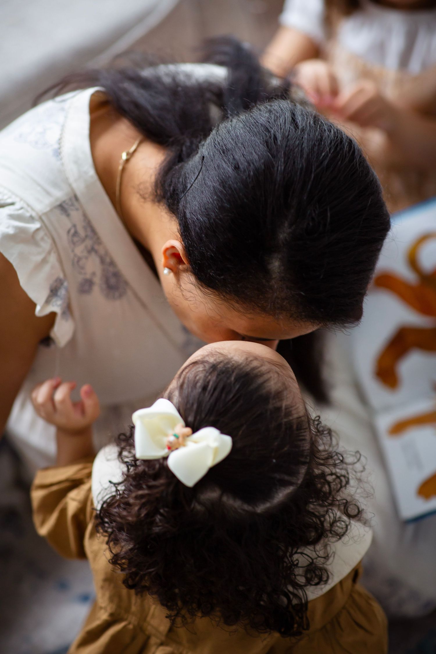 Little girl and mother share a moment