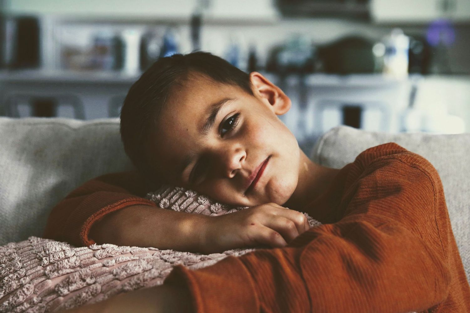 Young son in relaxed pose.