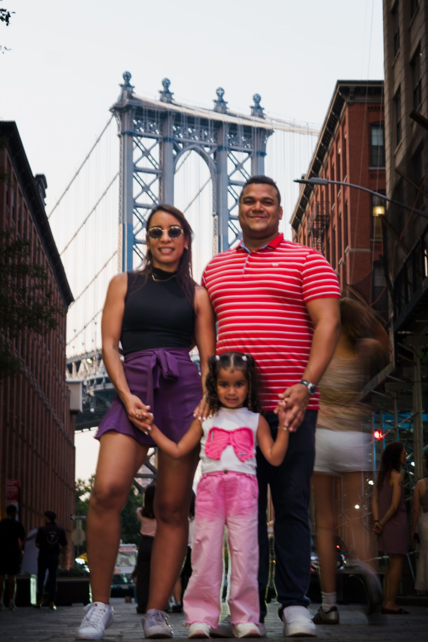 In front of the bridge
