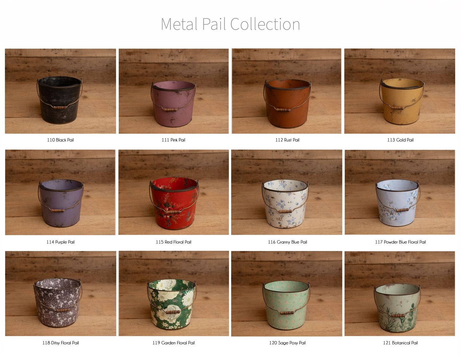 A collection of 12 vintage-style distressed metal pail planters in various colors displayed on a rustic wooden shelf.